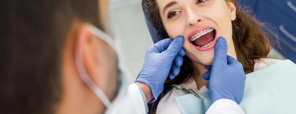 Selective,Focus,Of,Woman,In,Braces,Opening,Mouth,During,Examination